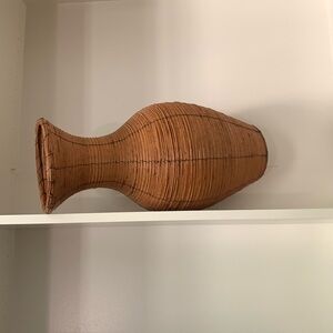 Wicker floor vase. 20 1/2 by 8 inches.